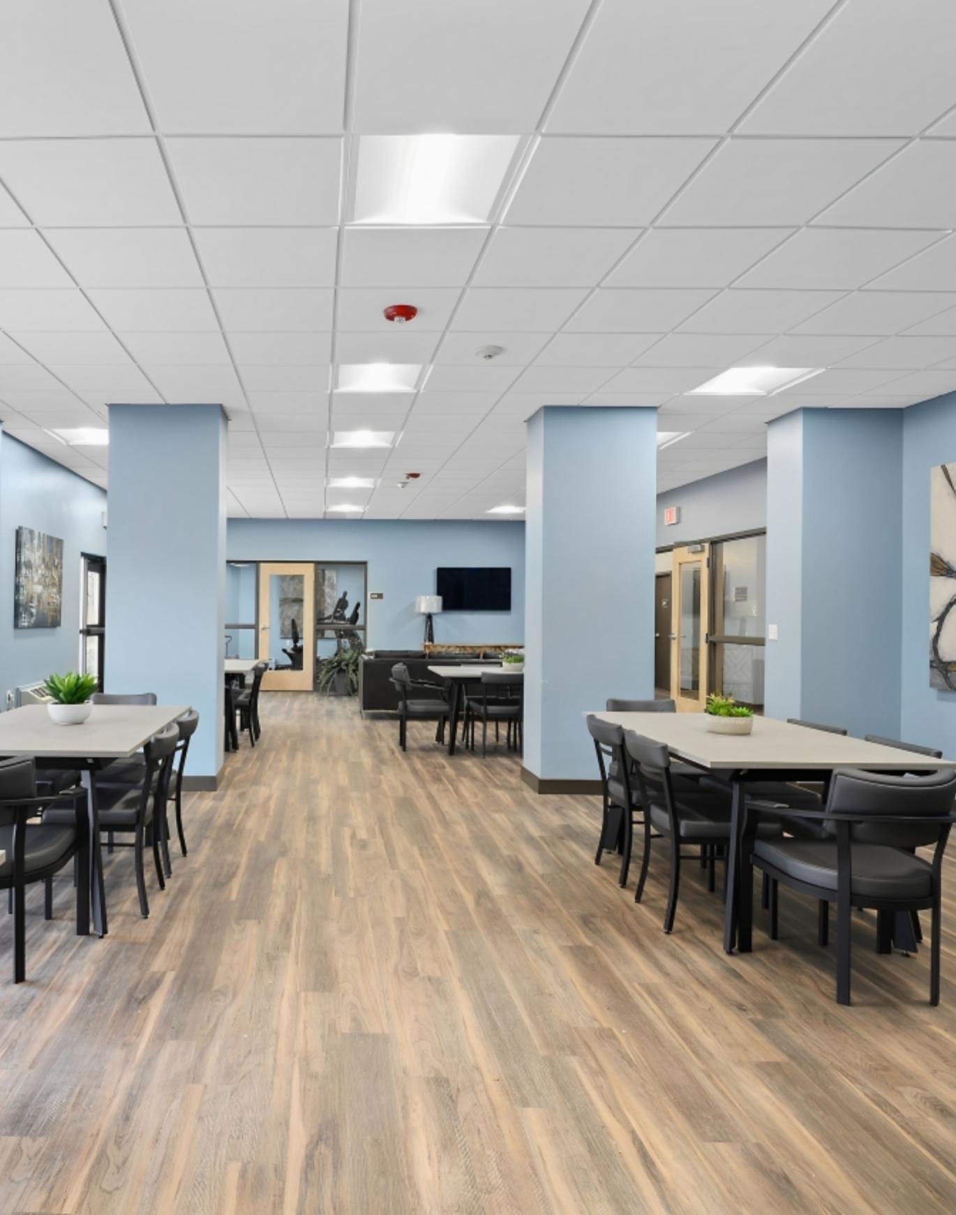 a room with tables and chairs